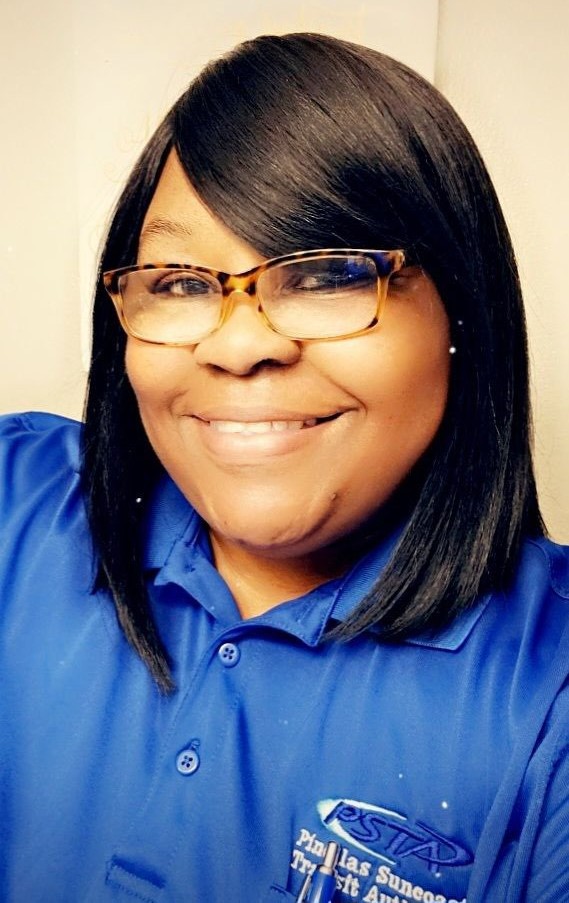 Photo of Tameka Hubbard wearing a blue PSTA polo shirt
