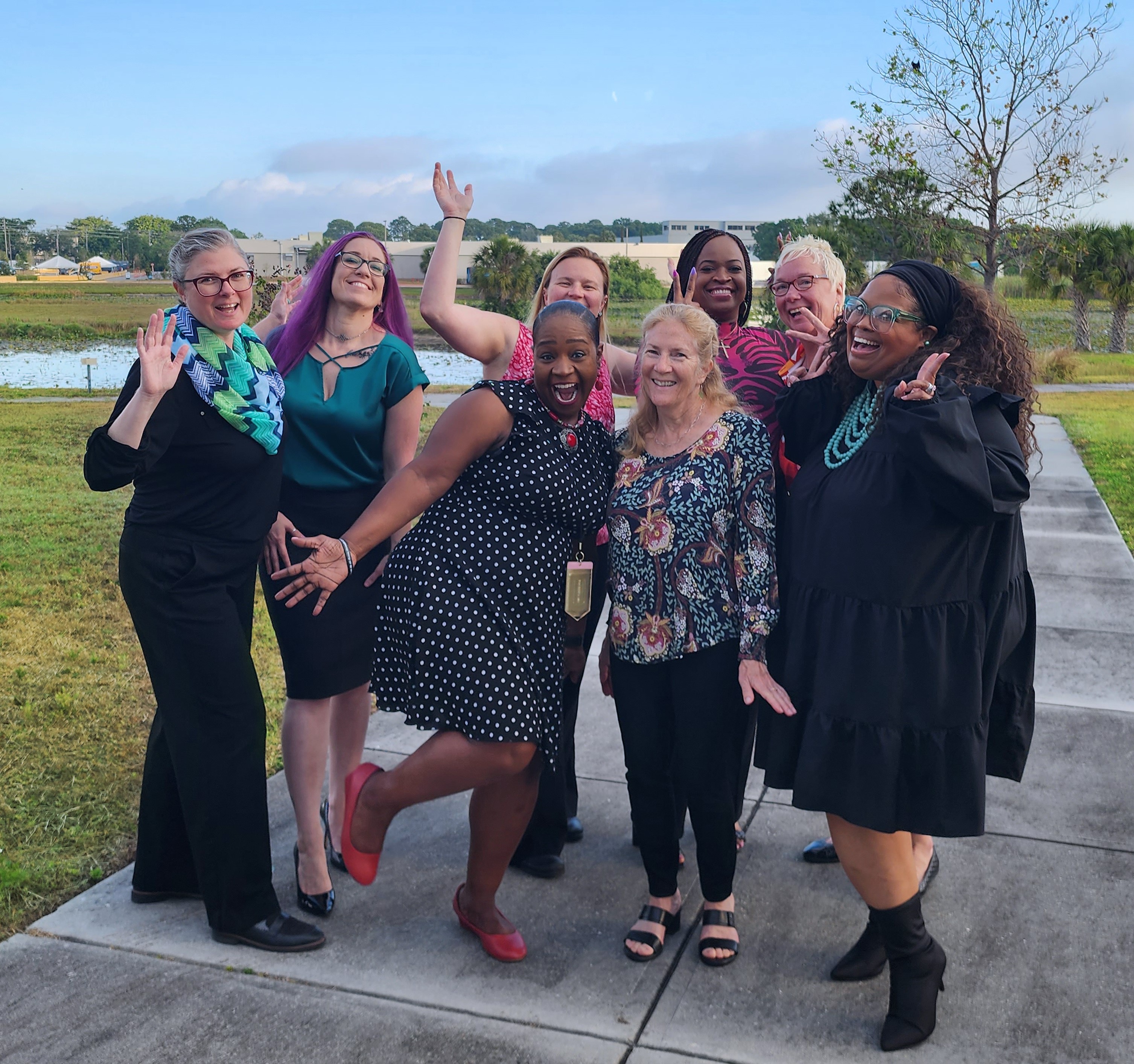 The amazing women of the PSTA HR department poses together