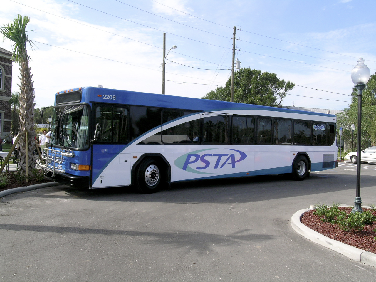 A photo of the newly branded PSTA bus unveiled in 2004 to celebrate PSTA's 20 year anniversary. The new blue and teal swoopy logo would replace the retro orange and gray logo of the 80s.