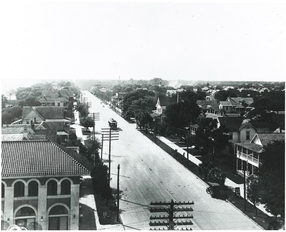 An aerial black and white photo of of Central Avenue looking west from 5th Street in 1912. You can see a streetcar making it's way down the street.