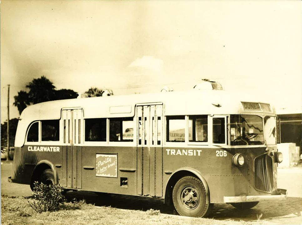 A black and white photo of a small 50's era bus owned by private bus line Clearwater Transit Inc.