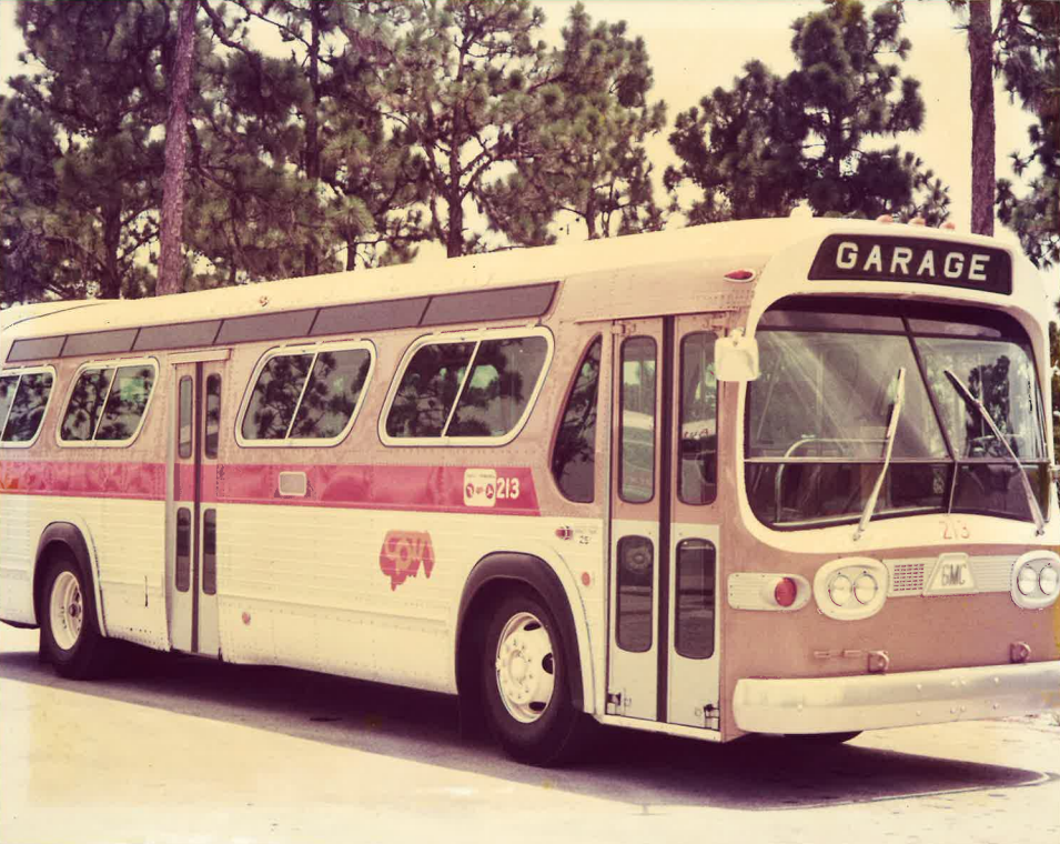 A color photo of a brand new CPTA bus with red and orange branding from the 1970s