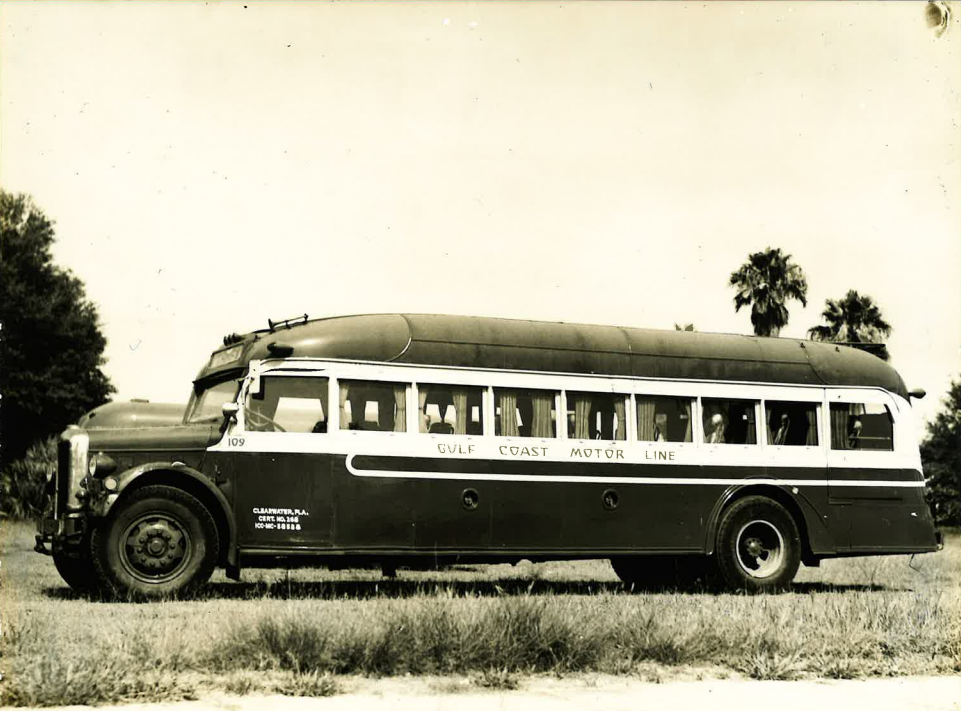 A black and white photo of a 50's era bus for private bus line Gulf Coast Motor Line