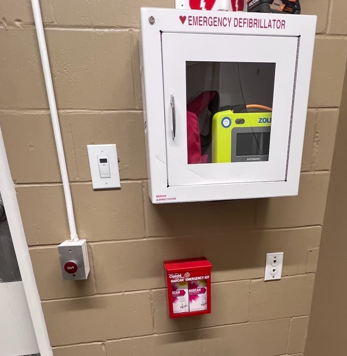 A Narcan Emergency Kit at Grand Central Station, installed near the existing fist aid kit and defibrillator.