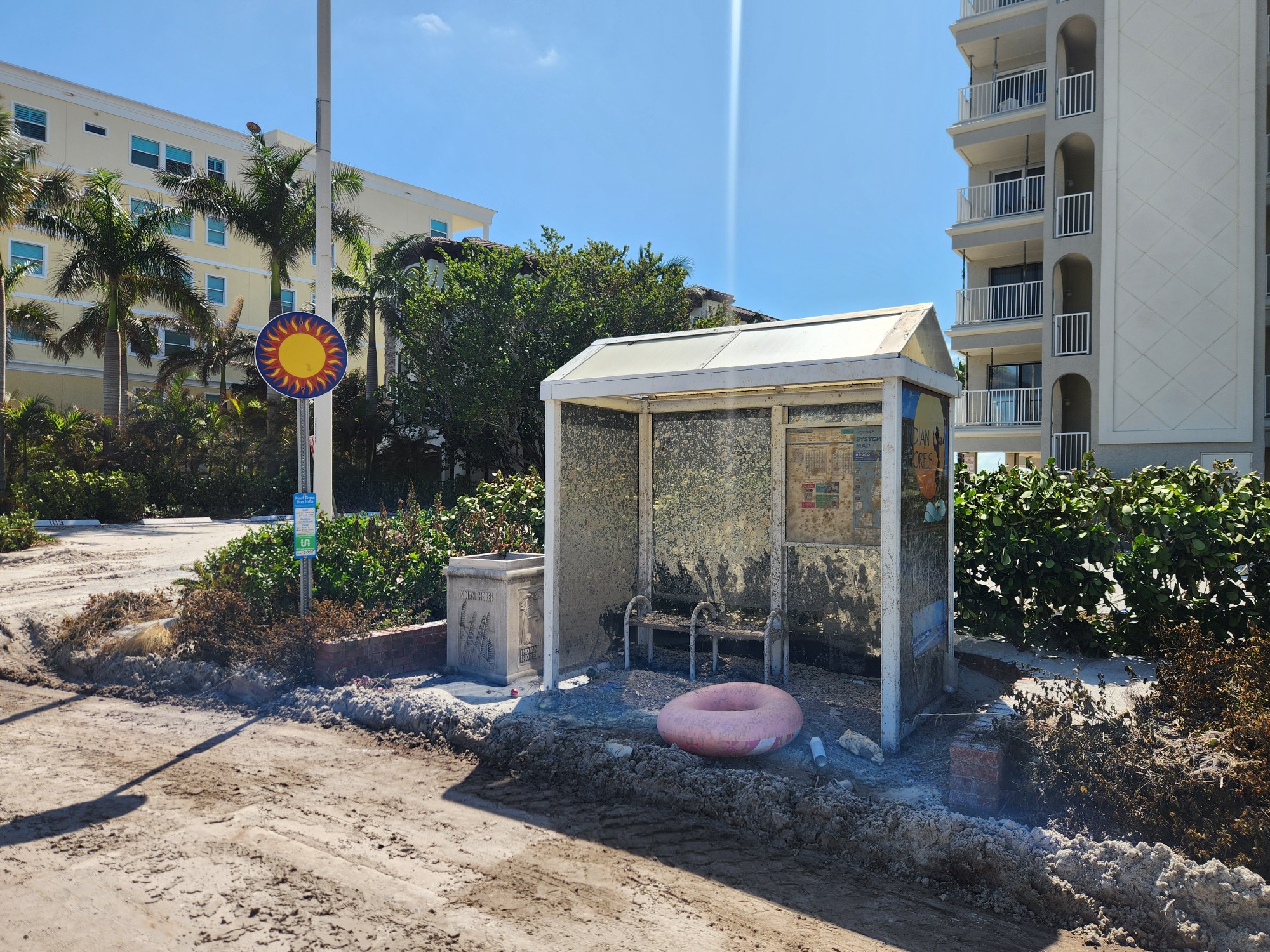 A PSTA shelter covered in sand, mud, and debris from several feet of storm surge on the barrier islands.