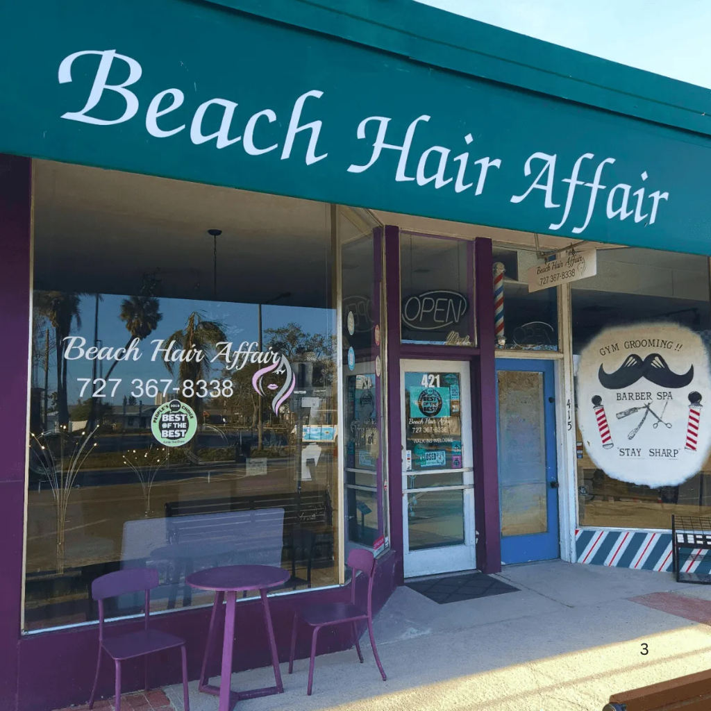 The purple and green storefront for "Beach Hair Affair" on St. Pete Beach